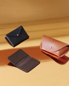 Klaus Goods Giordi slim wallet, Crawford envelope purse and Wenders eyeglasses case. Photo - Sean Fennessy. Styling - Nat Turnbull for The Design Files.