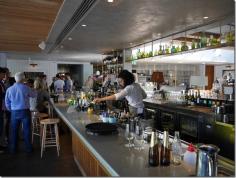 Cocktail bar at Hotel Centennial, Woollahra. I can easily knock back a few drinks when a cocktail bar is so elegantly designed. It is among some of the more stylish bars around Sydney.  Apart from the overhead display of wines, subtle down lighting, tasteful music from a quality sound system and stylish marble stone surfaces, here’s my definition of good bar space design ~ when you can pivot and swivel forearms on the counter top without knocking over beers and cocktails.