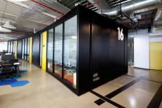 This corporate office in the Polanco neighborhood of Mexico City uses bright, bold colors and fun, graphic details for an energized workplace.