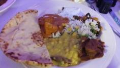 Indian food - daal, naan, chicken curry, rice, okra, and yoghurt.  So delicious!