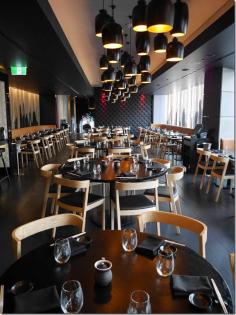 Fish scale, hanging ropes along the walls and windows are predominant motifs of a modernist decor in the main dining room of Sokyo, The Star, Sydney.