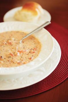 Tomato Basil Parmesan Soup in crock pot.