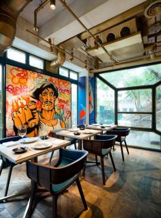 the restaurant is an ongoing project that works with artists, both contemporary and street, from around the world and displays their work together in the space.