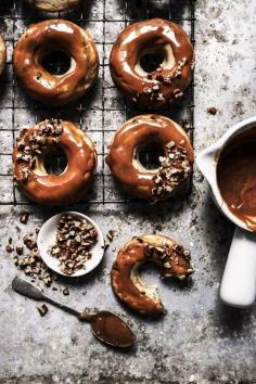 
                        
                            banana chocolate chip baked doughnuts with a caramel pecan glaze | twigg studios
                        
                    