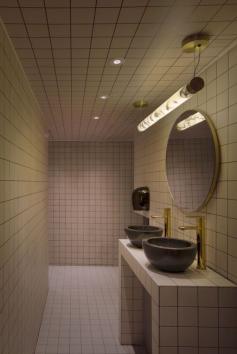 
                    
                        The marble Tube Light is featured in Lee Broom's interior design for the new restaurant Old Tom and English in London.
                    
                