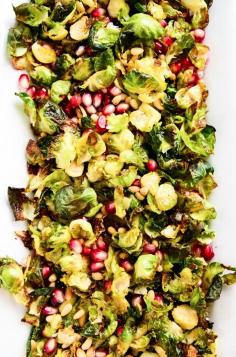 
                    
                        CRISPY BRUSSELS SPROUT SALAD WITH POMEGRANATE SEEDS
                    
                