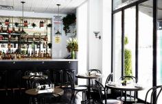 
                    
                        Classic bar with floor to ceiling windows
                    
                