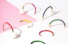 
                    
                        ‘Mixed Doubles’ hand painted leather bracelets by Melbourne designer Jen Booth. Photo – Elise Wilken, Styling – Nat Turnbull on thedesignfiles.net
                    
                