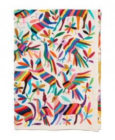 
                    
                        Hailing from Mexico, this Otomi bedcover is hand embroidered with brightly hued and whimsical birds and animals.
                    
                