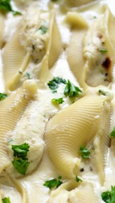 
                    
                        Chicken Alfredo Pasta Shells ~ Decadent and delicious... ricotta chicken stuffed shells swimming in a rich Alfredo sauce.
                    
                