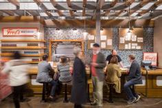 
                    
                        In November 2014, Krog Street Market opened within the former Atlanta Stove Works storage house, a brick warehouse dating back to the 1920s.
                    
                