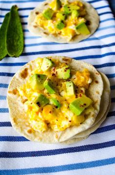 
                    
                        Scrambled eggs with feta and avocado. Creamy and so luscious!
                    
                