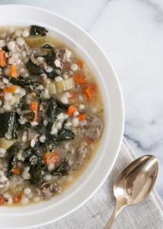 
                    
                        KALE, SAUSAGE, AND COUS COUS STEW
                    
                