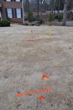 
                    
                        Preparing for the installation of underground downspout extensions on Between Naps on the Porch
                    
                