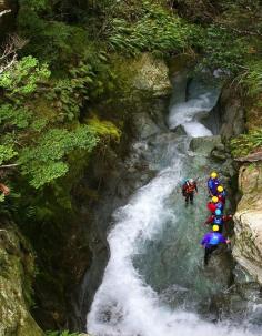 
                    
                        If you go on an "ultimate hike" along the alpine Routeburn Track outside Queenstown, you may come across some wild-eyed people peering down into a canyon. They're about to jump in or maybe rappel down, because merely hiking a mountain face is too tame here.
                    
                