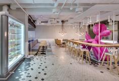 
                    
                        Each of the geometric tiles, all 10,000 of them, was handcrafted and organized into a random, puzzle-like pattern on the floor.
                    
                