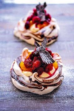 
                    
                        cranberry, orange and chocolate pavlovas.
                    
                