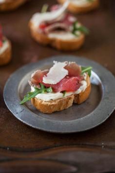 
                    
                        carpaccio of beef on a crostini with cheats aioli
                    
                