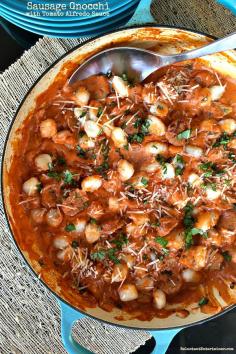 
                    
                        This Sausage Gnocchi with Tomato Alfredo Sauce recipe is combined with gnocchi, sausage, fresh basil and a creamy tomato sauce!
                    
                