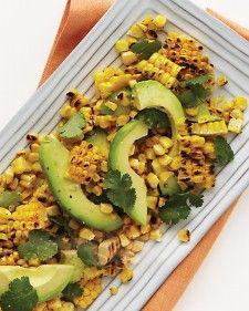 Corn, Avocado, and Cilantro Salad -  Martha Stewart Living, June 2011  Yield Serves 4. 4 shucked ears of corn. 1 sliced Hass avocado. 1/4 cup fresh cilantro. 1 tablespoon fresh lime juice. 1 tablespoon extra-virgin olive oil.1/2 teaspoon coarse salt. Heat grill to medium-high. Grill corn, rotating often, until lightly charred, 15 min. cool slightly. cut kernels from cob. toss with avocado, cilantro, lime juice, olive oil & salt. roasted pork loin or grilled lean pork chops.