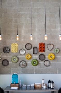 
                    
                        Bittersweet Treats, Pasadena, CA. Love the mounted cake tins!
                    
                