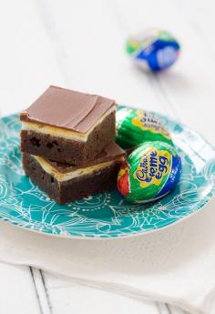 
                    
                        Cadbury Cream Egg Brownies - Fudgy milk chocolate brownies with a homemade cream egg filling and milk chocolate glaze.
                    
                