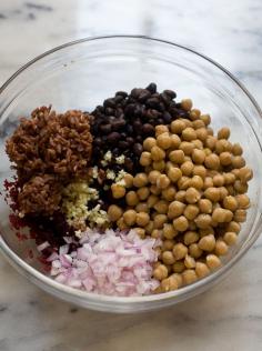 Irresistible Veggie Burgers Makes six burgers Patties: 8 ounces beets, steamed or roasted and peeled* 1 (15 ounce) can garbanzo beans, washed and drained 1 (15 ounce) can black beans, washed and drained 1/2 cup cooked brown rice 1/4 cup rolled oat flour** 1/2 red onion, diced 2 garlic cloves, minced 1 teaspoon sumac 1 teaspoon dried thyme leaves 3/4 teaspoon ground cumin 1/4 teaspoon ground coriander Salt Pepper
