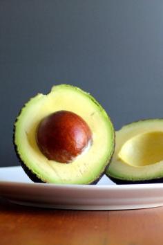 If you purchase avocados, you probably know the proper technique for checking for ripeness. Give the flesh a soft squeeze, and it should yield to moderate pressure. However, sometimes a soft avocado is actually bruised. Since there's nothing more disappointing than slicing into a browned avocado, I've got another way of testing for ripeness. Flick the small brown stem off the top of the avocado. If it comes off easily and you can see green underneath it, the avocado is ripe! If the stem doesn't come off or if you see brown, the avocado is not ripe.