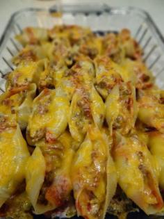 Mexican Stuffed Shells. Look soooo good. Made with ground beef, taco seasoning, cream cheese, jumbo pasta shells, Monterey and cheddar cheeses and a few other ingredients. This would make a wonderful weeknight dinner with a side salad. Make two trays, because it's a great freezer meal too. dessertationblog....