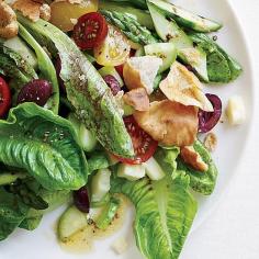 
                    
                        Grilled Asparagus Salad | Bobby Flay makes this delightful grilled asparagus salad with sweet grape tomatoes, briny kalamata olives and sharp white cheddar. Each bite brings out a different combination of ingredients.
                    
                