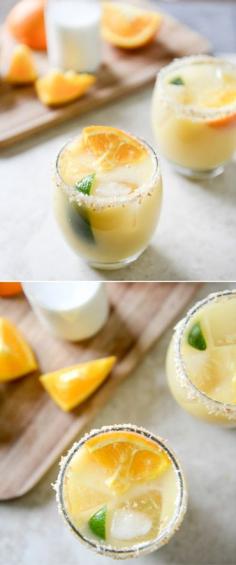 
                    
                        Coconut Creamsicle Margaritas and TONS of Cinco de Mayo recipes! I howsweeteats.com
                    
                
