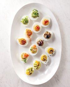 
                    
                        Martha Stewart's Definitive Deviled Eggs, from top: Watercress-Horseradish; Roasted Pepper-Thai Chile; Tomato-Pimenton; Olive-Garlic; Smoked Salmon-Radish; Miso-Sriracha; Avocado, Anchovy, Caviar
                    
                