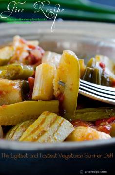 Zucchini with Olive Oil - [Give Recipe] Beautiful summer dish. Serve cold with additional olive oil drizzled. Put all vegetables in a pot - onion, zucchini, tomato, green onion and garlic.  Dissolve Pepper paste in water and pour it over veggies. Add in salt, black Pepper and red Pepper flakes. Pour vinegar and lemon juice over them. Add 3 T olive oil and cover. Cook it over medium-low heat for 20 minutes. Chill it at least for 30 minutes and drizzle over extra 2 T olive oil.