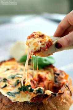 
                    
                        Cheesy Pizza Dip Bread Bowl - the cheesiest, most delicious 'dip' you'll ever eat!
                    
                
