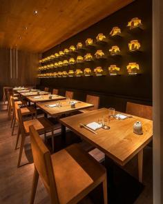 
                    
                        A Wall Of Uplit Glass Jars
                    
                