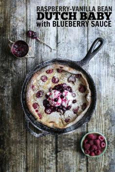 
                    
                        Raspberry-Vanilla Bean Dutch Baby with Blueberry Sauce
                    
                