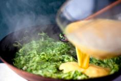 
                    
                        These scrambled eggs, flecked with squash, take just a few more minutes to throw together than plain scrambled eggs, and it’s an excellent way to use that zucchini lingering in your vegetable drawer. If you want a richer dish, serve this with avocado. (Photo: Andrew Scrivani for The New York Times)
                    
                