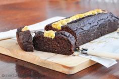 
                    
                        Well this was totally unplanned! Making recipes on holiday in Lanzarote in  my hosts kitchen!  I have been eating (and enjoying!) all my meals with them, it's so lovely  to be cooked for, especially since they eat a plant based diet also... i'll  admit I haven't even needed to leave their house!   Since I happened to mention I write a food blog, I was offered the  opportunity to come up with a healthy cake or dessert using 'anything I  could find' in the kitchen. Wow, what an opportunity... though I was also  pretty nervous and apprehensive in case it didn't work out! It's one thing  wasting your own ingredients but anything things when it's someone else's  food!  Of course I wanted it to be as low in sugar as possible, and ideally  contain chocolate, since I hadn't had any all week and it was calling to  me! I needed a foolproof recipe that I knew would stand the least chance of  failure.... that's when my crazy chocolate courgette cake came to mind.  That cake is loved me so many, uses simple ingredients and I knew it would  be a winner. To change it up a little I swapped the courgette for banana.  This was in large part so that I could get away from using refined sugars-  in the courgette version I use dates and pure stevia, but since I had no  stevia to hand, I used bananas (and a teensy bit of brown sugar just to be  sure) to hit the sweet spot.  Flour was also another factor to work around. I usually use fine ground  oats in this recipe. All I had to hand here were emmer grains (an ancient  grain similar to spelt and einkorn). This is what they mill to make their  own bread, so we milled some for this recipe. It worked perfectly....  phew! I imagine any of the ancient grain flours (or even regular  wholewheat) would make a good substitute, or use fine oatmeal as per my  original recipe (I haven't tried with purely GF flours but buckwheat could  be a good bet of you do experiment).  Emmer grains- pre milling  Emmer flour being milled!  I also had to improvise with other ingredients too. Usually I use a  combination of baking soda and baking power. But there was only soda to  hand... a quick google gave me my solution. Baking soda needs an acid to  react to, so I simply added lemon juice to the mix and it worked perfectly  on its own.  This basic recipe has been tried so many times now with little  tweaks, it is virtually foolproof I promise!   The verdict... they all loved it! Even two year old Shakti!  I called this 'brownie bread'... and it's shaped like a loaf and best  described as a cross between banana bread and chocolate brownie!  The banana pieces on top were beautifully caramelised and chewy... feel  free to add more or even mix some chunks into the mix to vary the texture  and make more of a dessert bread, that would be amazing served warm with  vegan cream or ice-cream.... or a slathering of peanut butter! Oh yeah.  You'll find plenty more of my 'loaf' style recipes HERE!  Recipe: Chocolate banana brownie bread  Makes 1 long shallow loaf (or equivalent of a deep brownie pan)  Ingredients:      * 3/4 cup dates (packed quite tightly)     * 1/2 cup boiling water (may need to add a few tablespoons extra at the       end)     * 1/4 cup coconut oil     * 2 tbs chia seeds (or flax)     * 1 tbs fresh lemon juice     * 4 medium bananas (3 to be pureed and 1 chopped for the top)     * 2-3 tbs brown sugar (you could omit this or sub with syrup or stevia)     * 2/3 cup cocoa     * 1 1/2 cup emmer flour (or other flours as noted above)     * 1 heaped tsp baking soda  Method:  Soak the dates in the 1/2 cup boiling water for a few minutes to soften (  I did this as I only had a small stick hand blender to use, soaking it  optional for more robust blenders so you could just add water separately).  Add the coconut oil to melt it. Add three rough chopped bananas, the  chia/flax and the lemon juice to the date/oil mix and blend until very  smooth. All the wet ingredients should now be mixed.  In a separate medium bowl mix together the emmer flour, cocoa and baking  soda. Add the pureed mixture and stir through unit combined. Taste and  add the brown sugar (or sweetener of choice) to taste. I only needed 2  tablespoons.  The mixture should be a soft spoonable batter. Add a few tablespoons extra  water if needed (I added a couple). Spoon the mix into a greased and lined  cake tin/loaf tin of choice (or muffin cups). Smooth the top as much as  possonle then press the chopped banana pieces on top to decorate.  Bake for approx. 35-40 minutes at 180C (this will depend on the depth  on the cake pan and even less for muffins). I loosely covered the top with  foil after 20 minutes once the bananas were browned to prevent burning.  Check the cake with a fork or skewer to see that it comes away clean.  Why not sign up for my newsletter in my sidebar where I feature roundups  and special offers plus my FREE ebook. If you are new round here check out  my 'About' and 'Getting Started' tabs up top. To buy nibbles you can also  find me over at Wholeplus.   Day to day you can always find me hanging out in these places:      * Instagram     * Facebook     * Twitter     * Pinterest
                    
                