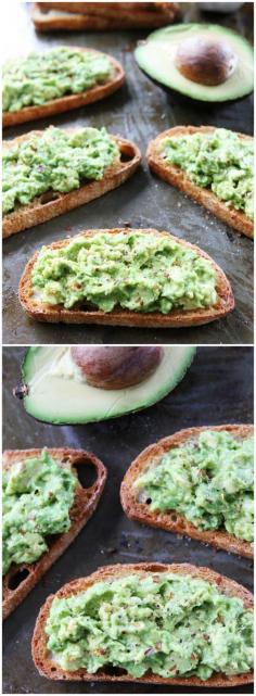 
                    
                        Garlic Bread Avocado Toasts on twopeasandtheirpo... The BEST garlic bread ever!
                    
                