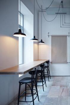 
                    
                        A White Minimalist Bistro In Prague | designed by Mimosa architekti and Modulora
                    
                