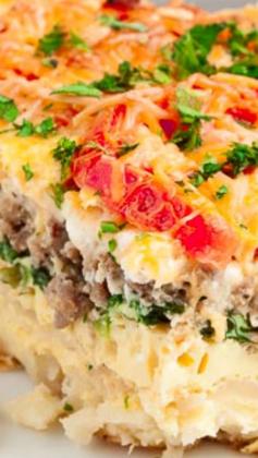 
                    
                        Hash Brown Tomato Breakfast Caserole ~ Soft, tender potatoes enveloped in cheesy goodness.  Savory browned sausage.  Roasted tomatoes on top...  Easy peasy, delicious, mouthwatering dish
                    
                