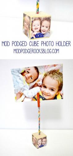 
                    
                        Create a unique DIY photo holder using a small wood cube and your favorite photos! Just add decoupage medium and you're done.
                    
                