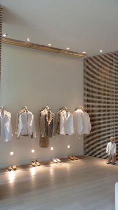 
                    
                        Nice lighting and racks at low level.  100% Capri store by Giachi Design, Miami
                    
                