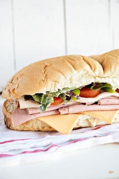 
                    
                        Hero Sub Sandwich recipe with super simple sauce. This is a great game day idea for a crowd! From dineanddish.net
                    
                