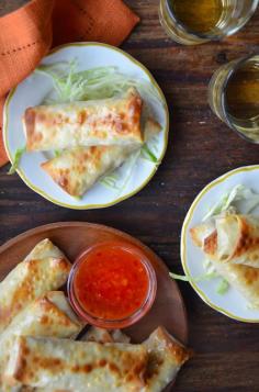 Crispy Baked Chicken Spring Rolls. Filled with a hearty mix of chicken, shredded green cabbage, sliced shitake mushrooms, and tons of fresh garlic and ginger. A fantastic recipe. #baked #springrolls #chicken #partyfood #fingerfood #recipe #smarthomesforliving