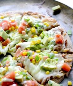
                    
                        SKINNY TACO PIZZA WITH CORN, AVOCADO, AND TOMATOES
                    
                
