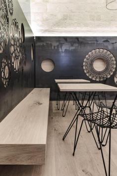 
                    
                        Decorative Motifs Cover The Walls Of This Italian Cafe
                    
                