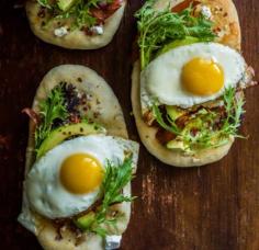 
                    
                        Breakfast Flatbread with Avocado, Feta, Prosciutto, and Fried Eggs
                    
                