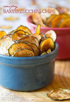 Crispy Baked Zucchini Chips Ingredients 4 large zucchini, evenly sliced 1/8 inch thick 2 tablespoons olive oil Salt ½ teaspoon Hot Smoked Paprika  ½ teaspoon Cumin  Directions: Slice the zucchini. (Using a mandolin helps keep the slices consistent.) Lay the zucchini slices on paper towels in a single layer. Cover with more paper towels and set a baking sheet on top of the zucchini slices. Press down on the baking sheet, applying slight pressure, to help squeeze out some of the moisture. Preheat the oven to 235 degrees F. (Preheat two ovens if you have them to fit more in at once.) Line several baking sheets with parchment paper. Brush the parchment paper lightly with olive oil. Lay the zucchini slices in a single layer on the parchment paper. Fit as many on each baking sheet as possible. Then lightly brush the top of the zucchini with olive oil. Sprinkle the zucchini slices with salt. You can also sprinkle with a little cumin and smoked paprika for extra flavor. Bake for 1 1/2 - 2 hours until crisp and golden.