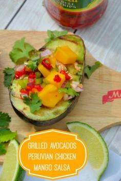 Grilled Avocados with Peruvian Chicken and Mango Salsa- spiced chilled chicken and sweet mango salad over creamy, hot avocados. Can you believe it only takes 15 minutes to prepare?? | #grilledavocados | www.savoryexperiments.com